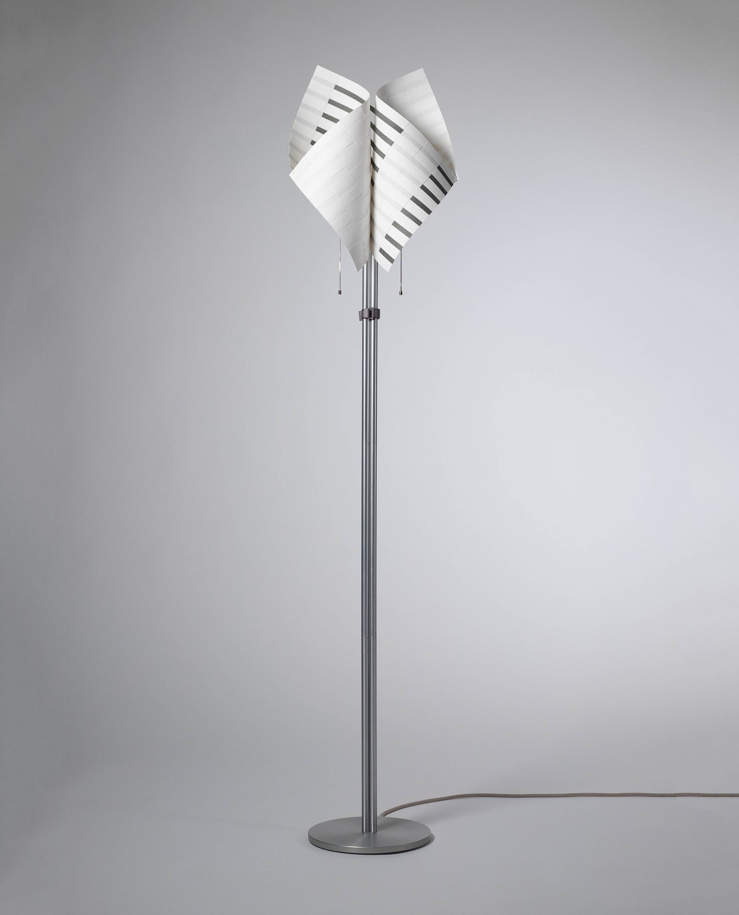 TEX001 floor lamp with light off, emphasizing the natural texture and meticulous craftsmanship of its handwoven paper lampshade, perfect for modern minimalist interiors.