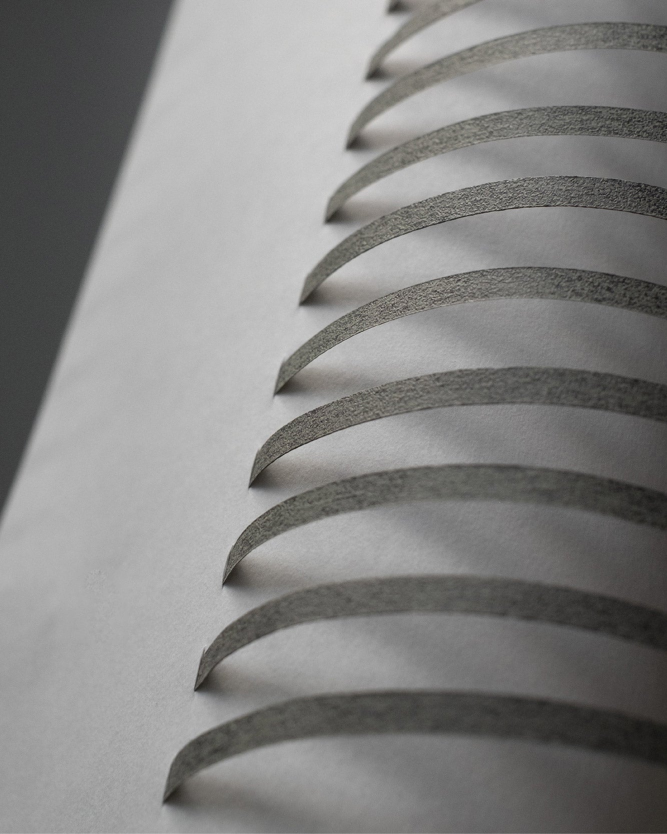 Close-up of the TEX002 lampshade, showcasing its intricate geometric design and neatly aligned stripes on the refined handwoven paper lampshade.