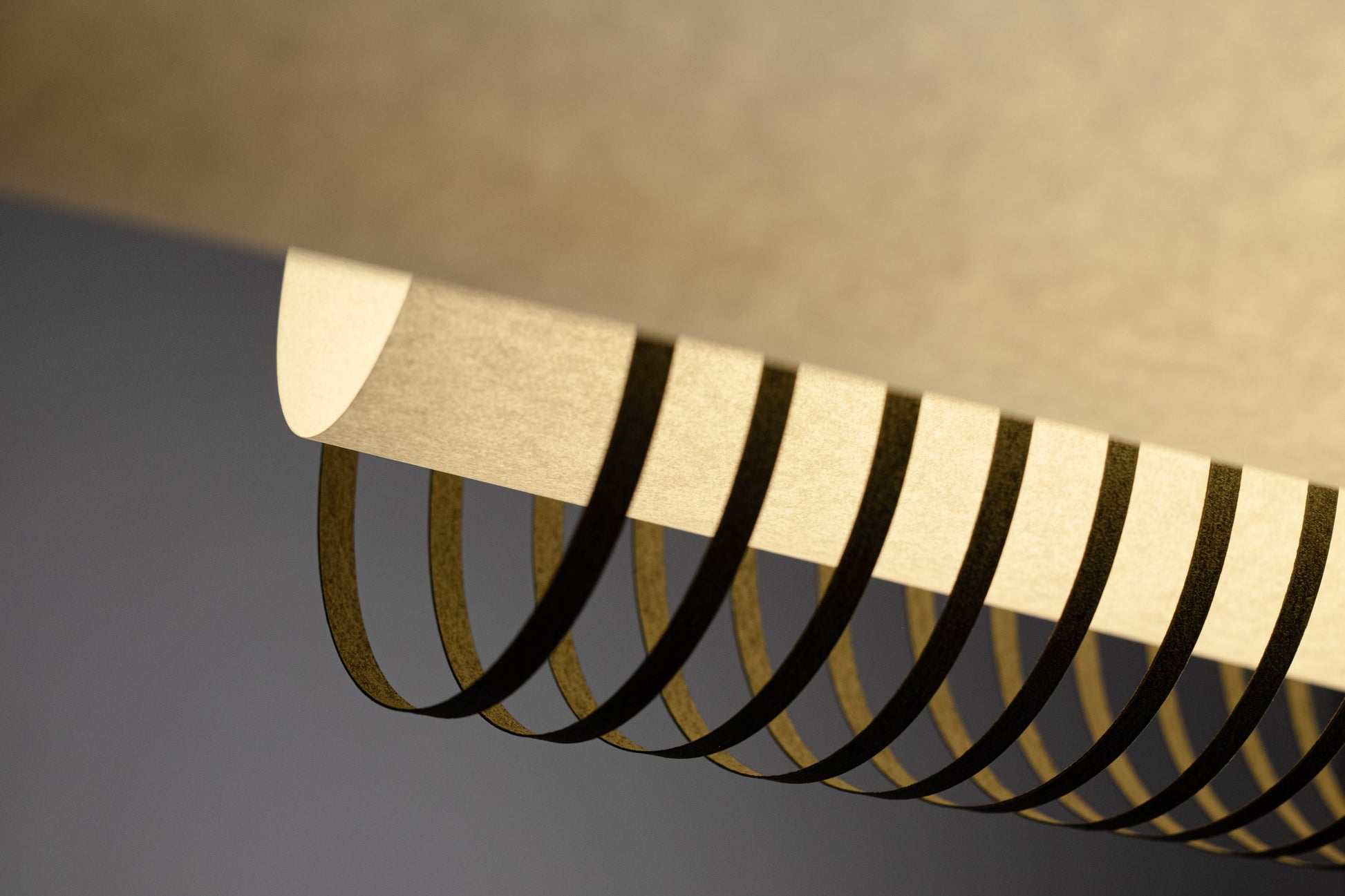 Close-up of the TEX002 pendant lamp, featuring an intricately handwoven paper lampshade, emphasizing its refined craftsmanship and architectural sophistication.