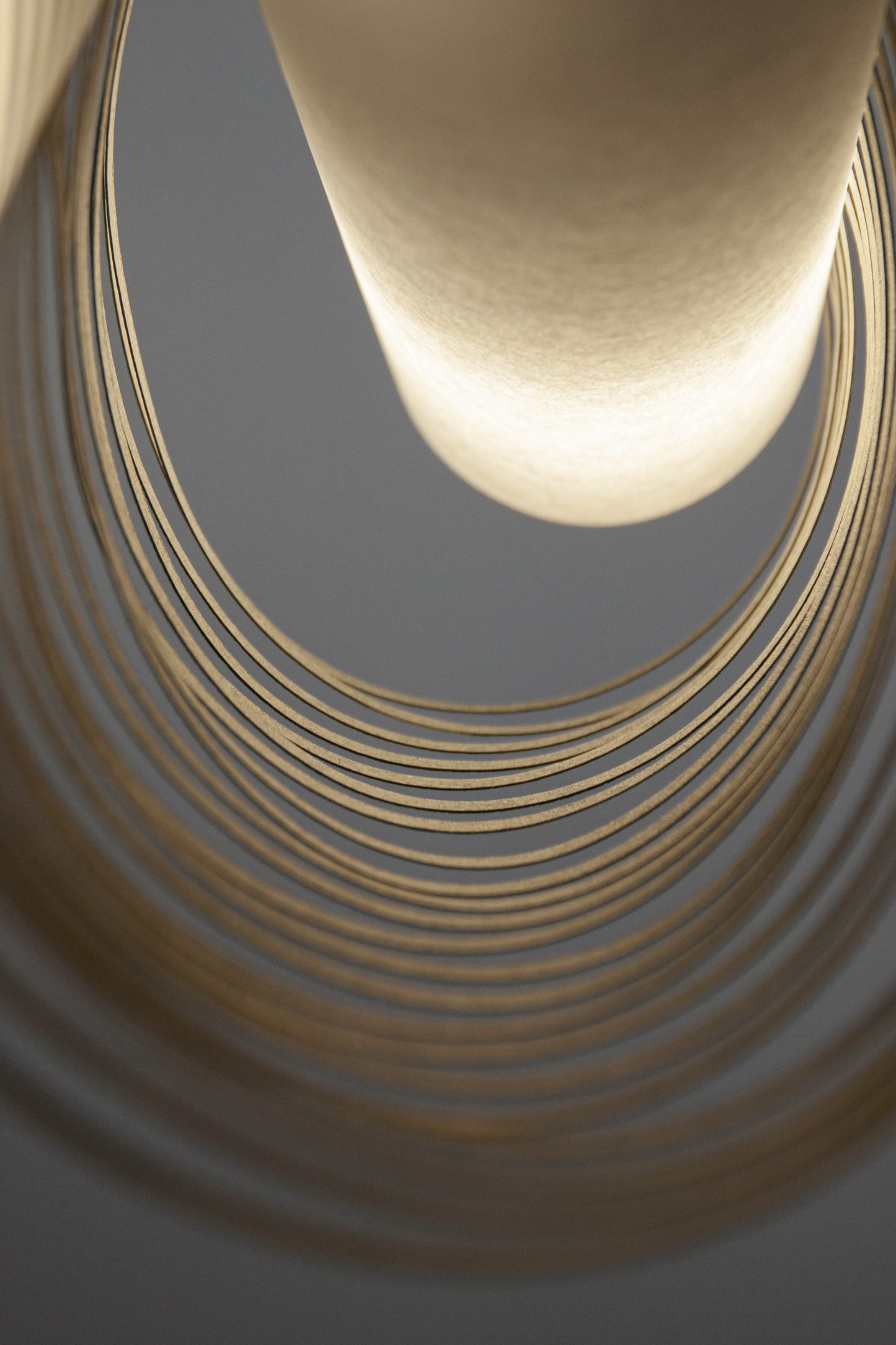 Close-up of the TEX003 pendant lamp, showcasing its intricate geometric design and neatly aligned stripes on the refined handwoven paper lampshade.